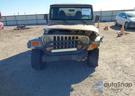 2000 Jeep Wrangler Sport from USA, damaged, VIN 1J4FA49S4YP752056